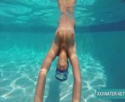 Hot brunette slut Candy swims underwater from fandy nude outdoor