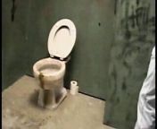 Fair-haired hottie likes to clean the bald dude's pipe through gloryhole and gets nailed in toilet from the bald sex