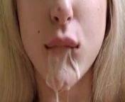 blonde babe sticks her tongue out for cum from tonques girl