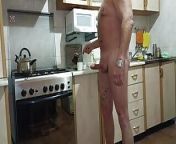 A naked man in the kitchen is making coffee while his wife is sleeping. from flashing coffee