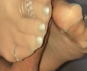 Nylon Footjob with silver polished toenails and toerings from nylon footjob cum