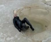 Super Hot Blond Girl In Black Latex Catsuit + High Heels And Sunglasses Bathes In The Mud - Mud Bath from mudu